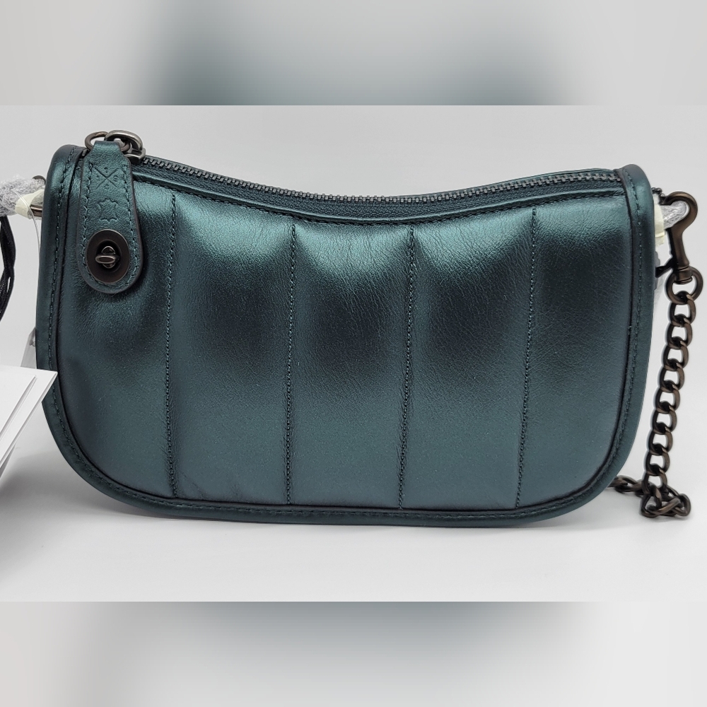 Coach swinger 20 with quilting in Metallic dark green/ New with tags